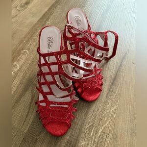 Glittery red strappy heels